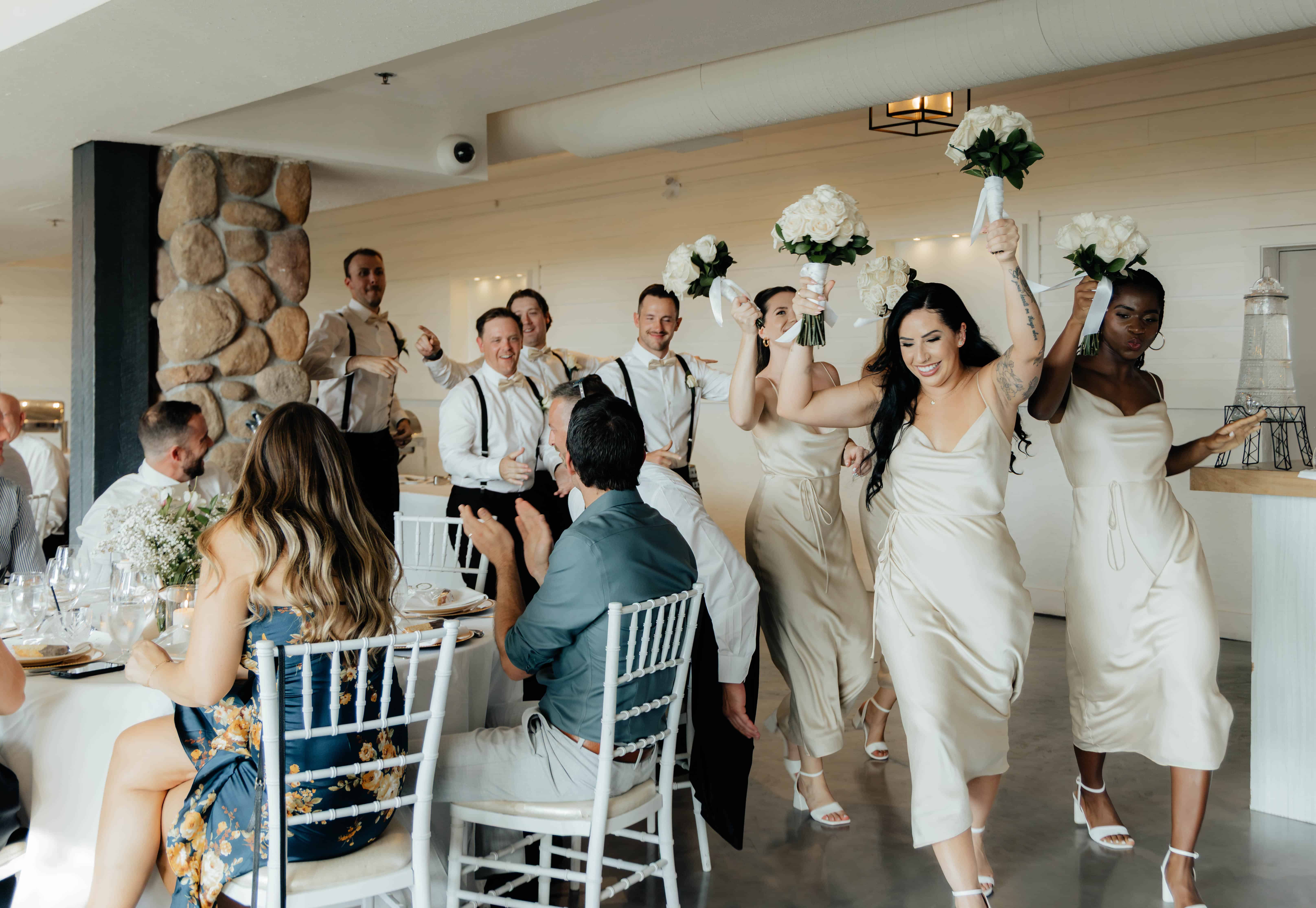 Fun wedding party reception entrance at Summerhill Winery, Kelowna