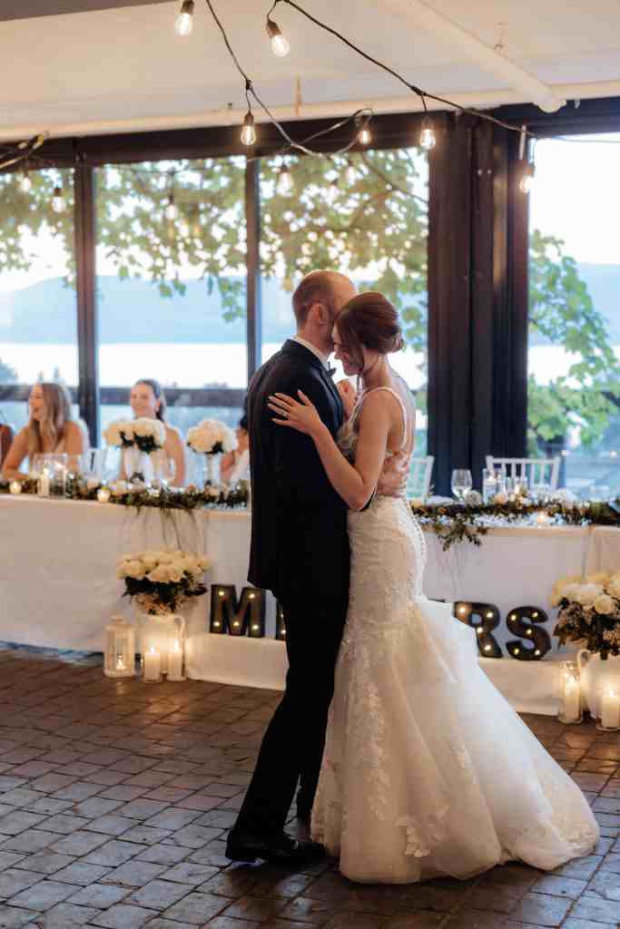 A bride and groom share their first dance at their wedding reception at Summerhill Winery in Kelowna, BC